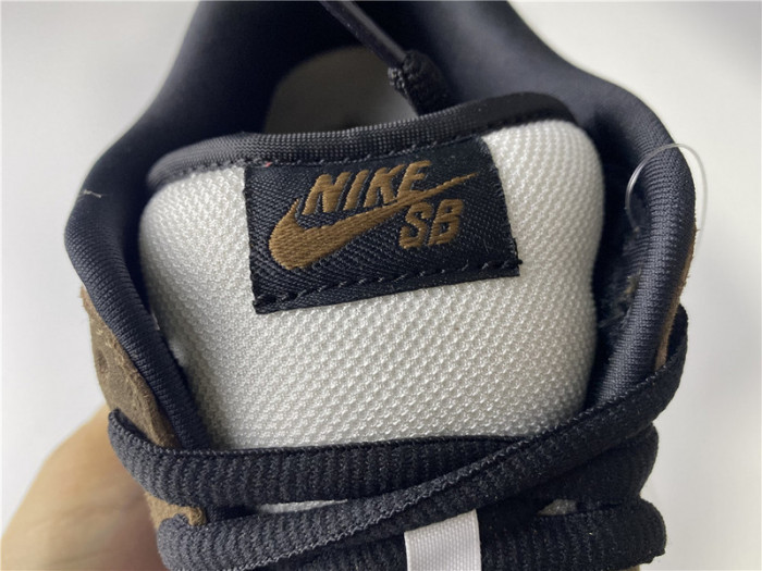 nike sb dunk low white black trail end brown 304292-102