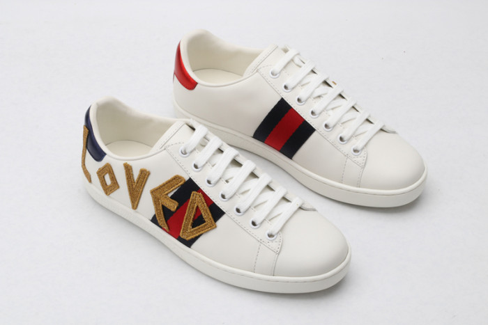 gu ace embroidered low-top sneaker