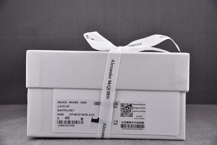 alexander mcqueen tread slick lace up boot black white