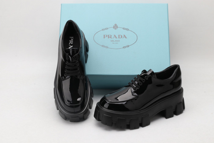 prad patent leather and nylon lace-up shoes