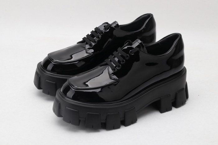 prad patent leather and nylon lace-up shoes
