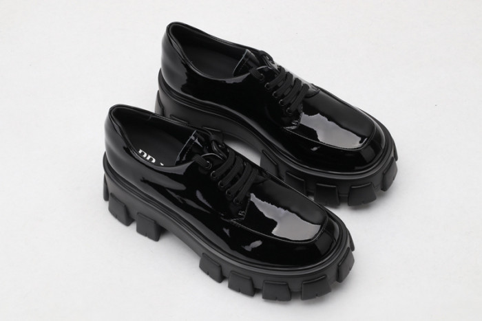 prad patent leather and nylon lace-up shoes