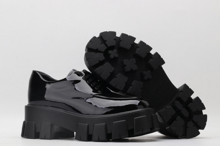 prad patent leather and nylon lace-up shoes