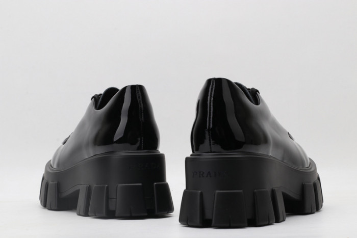 prad patent leather and nylon lace-up shoes
